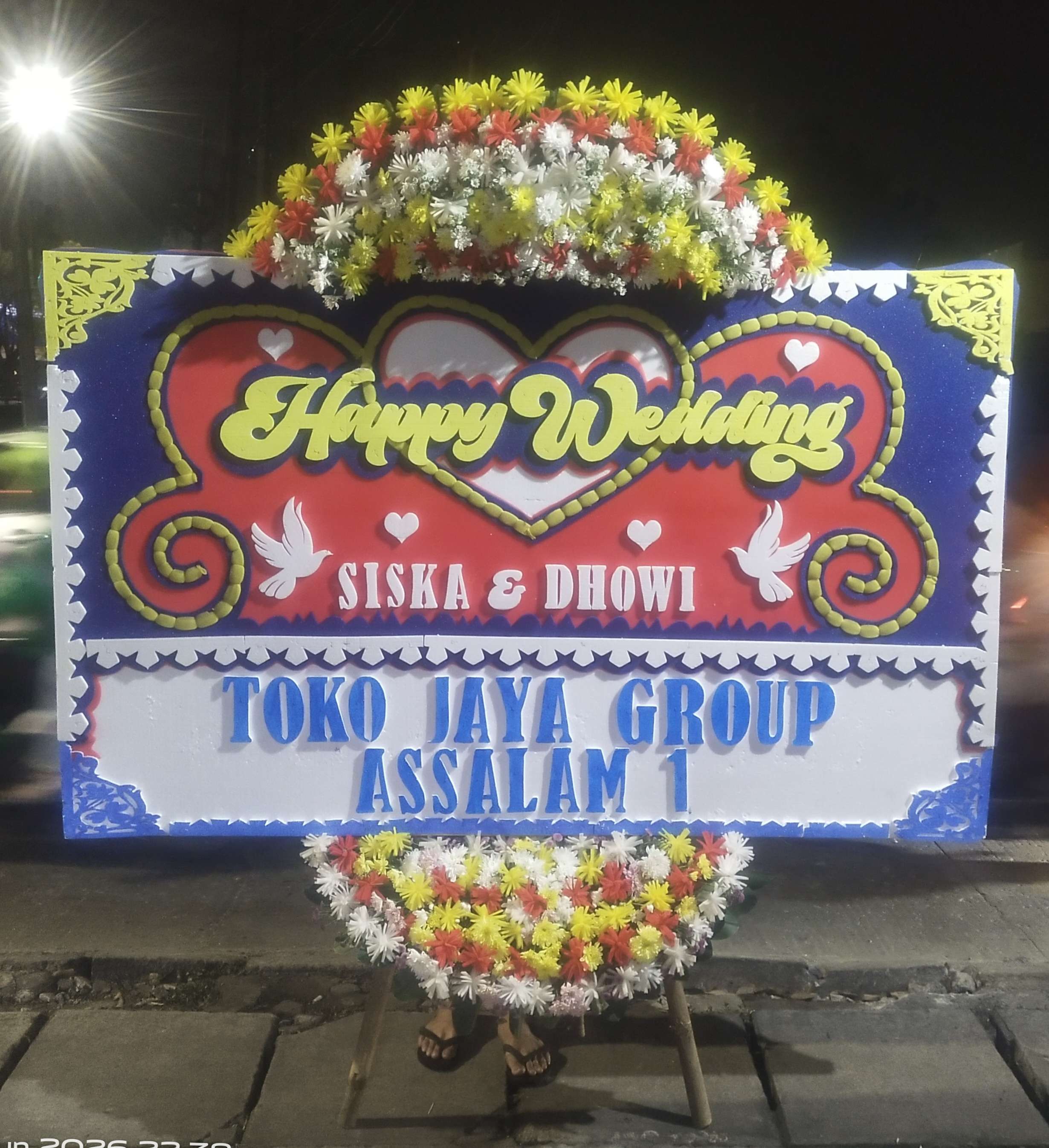 Karangan bunga happy wedding